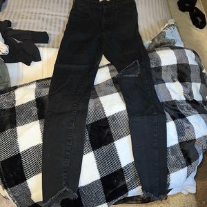 Mile high super skinny black Levi’s jeans.